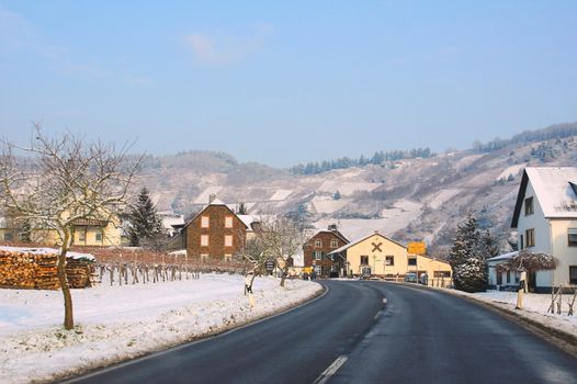 Road and entrance of Traben-Trarbach Wolf on the Moselle in snowy winter 2012/2013