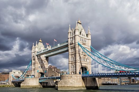 Tower Bridge (built 1886–1894) is a combined bascule and suspension bridge in London which crosses the River Thames.