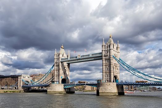 Tower Bridge (built 1886–1894) is a combined bascule and suspension bridge in London which crosses the River Thames.