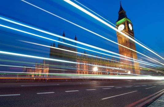 Big Ben and Westminster with traffic tail lights in the foreground