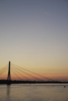 Vant bridge at night. Riga, Latvia, river Daugava