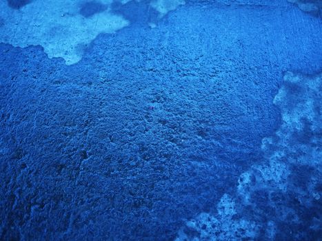 blue wall old cement background, wet texture