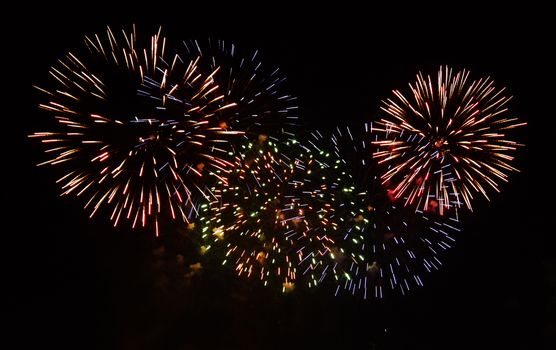 Colorful fireworks on the black sky for new year