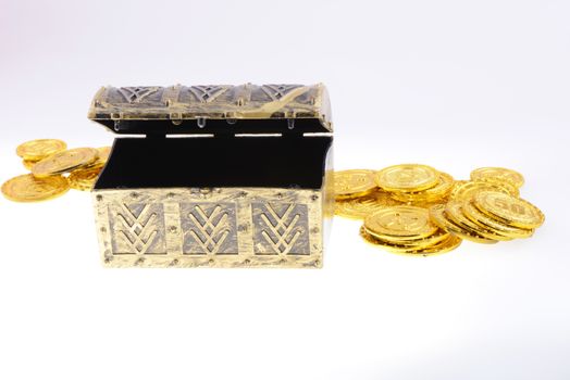 Treasure box with gold coins on a white background