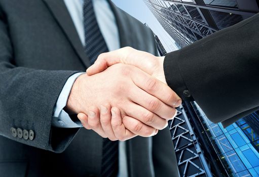 Business handshake, the deal Is finalized.