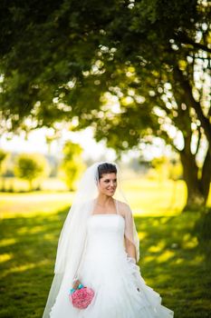 Gorgeous bride on her wedding day (color toned image; shallow DOF)