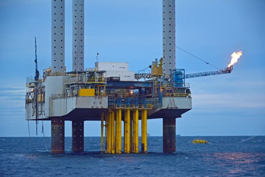 The offshore oil rig in early morning, Gulf of Thailand.