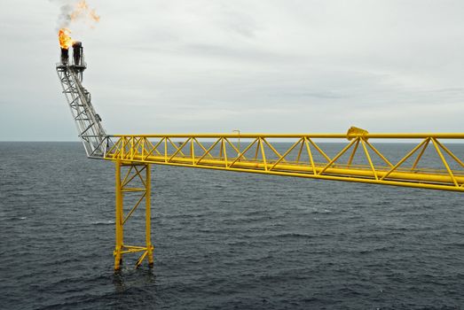 Flare boom nozzle and fire on offshore oil rig, thailand
