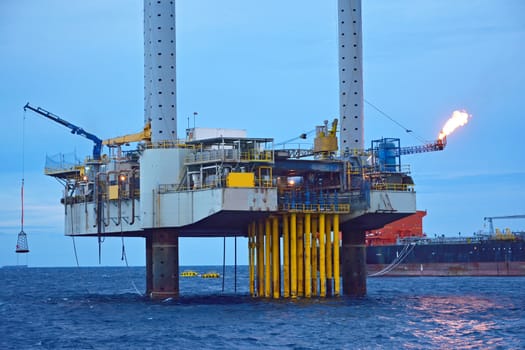 The offshore oil rig in early morning, Gulf of Thailand.