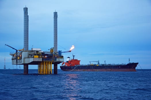 The offshore oil rig in early morning, Gulf of Thailand.