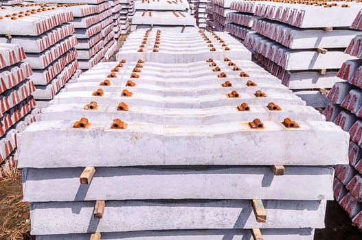 Stack of concrete sleeper made of steel reinforced concrete.