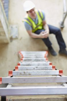 Construction Worker Falling Off Ladder And Injuring Leg