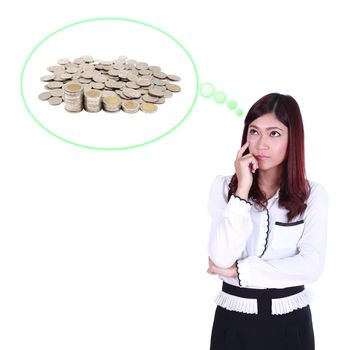 Business woman thinking about Piles of coins isolated on white background