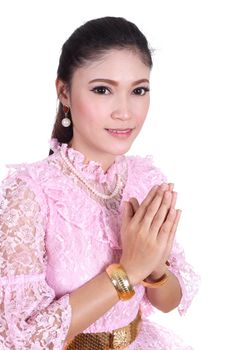 woman wearing typical thai dress pay respect isolated on white background, identity culture of thailand