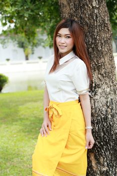 Thai women dressing with traditional style (garden background)