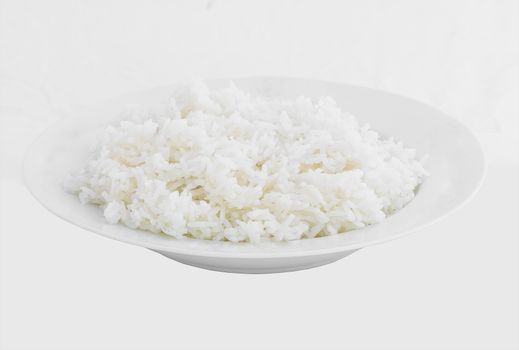 Dish of rice on white background