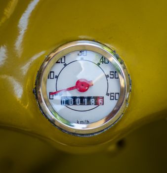 Mustard Yellow Vintage Retro Speedometer On A Moped Or Scooter