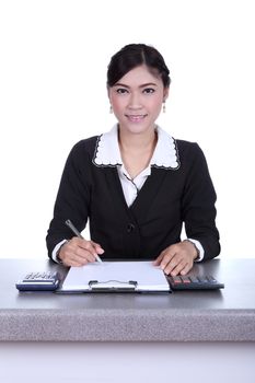 business woman sitting on her desk holding a pen working with documents sign up contract isolated on white background