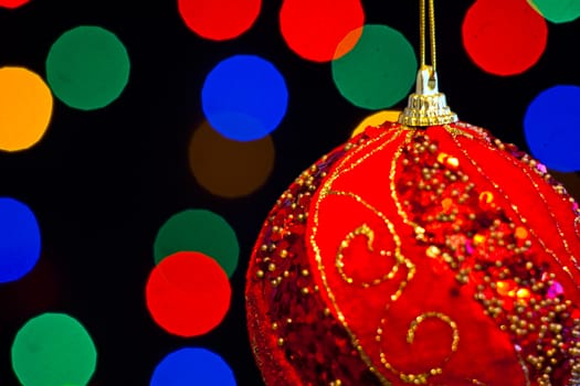 Red Christmas ball with lots of colors light