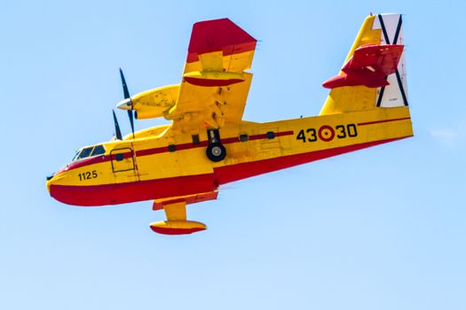 ALBACETE, SPAIN-JUN 23: Seaplane Canadair CL-215 taking part in an exhibition on the open day of the airbase of Los Llanos on Jun 23, 2013, in Albacete, Spain