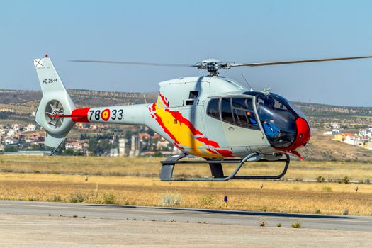 GRANADA, SPAIN-MAY 18: Helicopters of the Patrulla Aspa taking part in a exhibition on the X Aniversary of the Patrulla Aspa of the airbase of Armilla on May 18, 2014, in Granada, Spain
