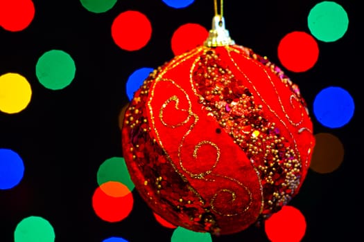 Red Christmas ball with lots of colors light