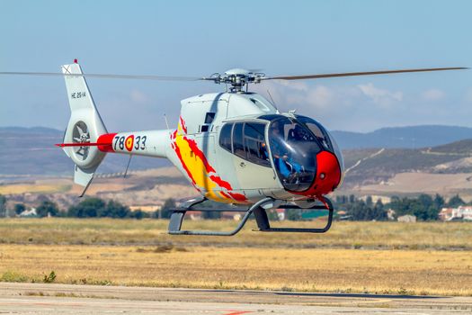 GRANADA, SPAIN-MAY 18: Helicopters of the Patrulla Aspa taking part in a exhibition on the X Aniversary of the Patrulla Aspa of the airbase of Armilla on May 18, 2014, in Granada, Spain