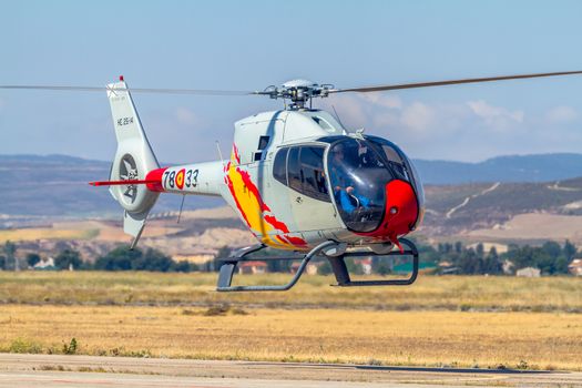 GRANADA, SPAIN-MAY 18: Helicopters of the Patrulla Aspa taking part in a exhibition on the X Aniversary of the Patrulla Aspa of the airbase of Armilla on May 18, 2014, in Granada, Spain