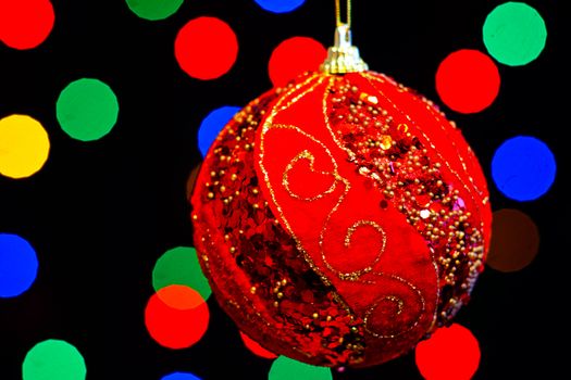 Red Christmas ball with lots of colors light
