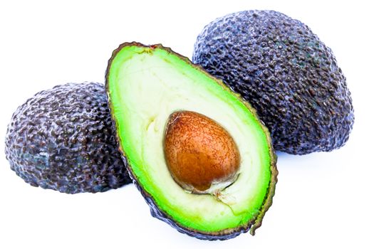 Composition of several avocados on a white background
