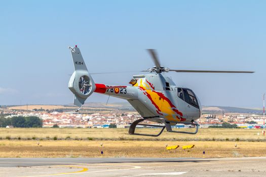 GRANADA, SPAIN-MAY 18: Helicopters of the Patrulla Aspa taking part in a exhibition on the X Aniversary of the Patrulla Aspa of the airbase of Armilla on May 18, 2014, in Granada, Spain