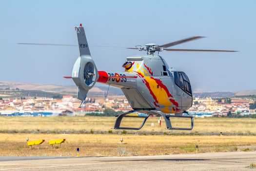 GRANADA, SPAIN-MAY 18: Helicopters of the Patrulla Aspa taking part in a exhibition on the X Aniversary of the Patrulla Aspa of the airbase of Armilla on May 18, 2014, in Granada, Spain