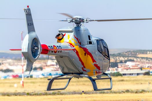 GRANADA, SPAIN-MAY 18: Helicopters of the Patrulla Aspa taking part in a exhibition on the X Aniversary of the Patrulla Aspa of the airbase of Armilla on May 18, 2014, in Granada, Spain