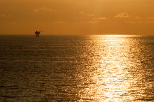 offshore rig in sunset