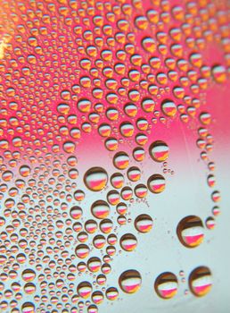 Drops of water on the crooked glass, shallow dof