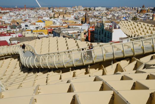 Metropol Parasol is a wooden building placed in La Encarnacion square, in the old quarter of Seville, Spain. It was designed by the German architect Jurgen Mayer-Hermann and completed in April 2011. The building is popularly known as Encarnacion's mushrooms.