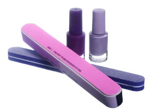 nail polish and tools  for manicure on  elegant fabric