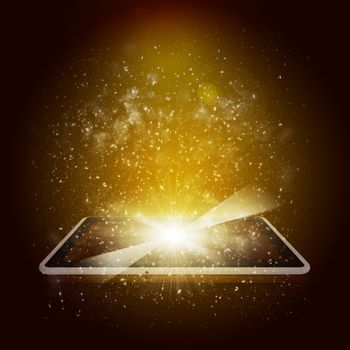 Tablet pc with magic light and falling stars. Dark background