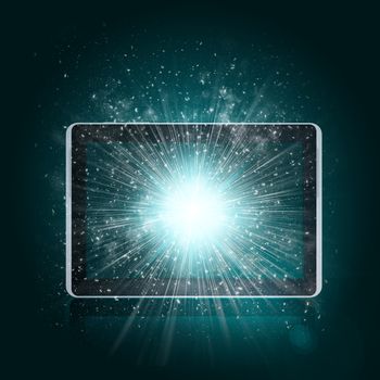 Tablet pc with magic light and falling stars. Dark background