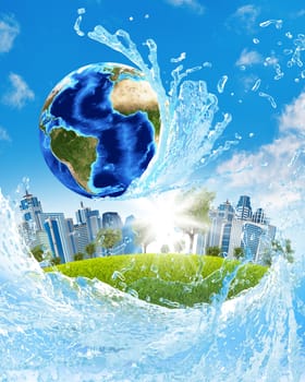 Earth, green grass, skyscrapers and water. Elements of this image are furnished by NASA