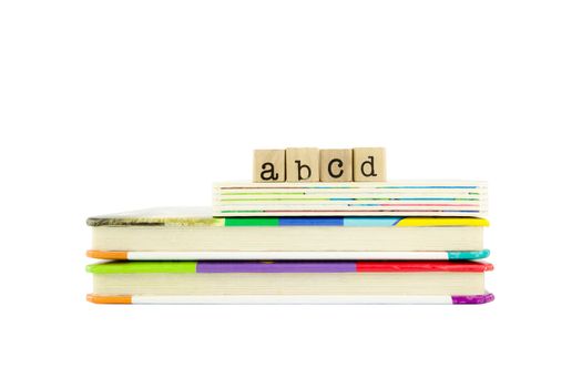 abcd word on wood stamps stack on children's board books, reading and learning language concepts