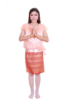 woman wearing typical thai dress pay respect isolated on white background, identity culture of thailand