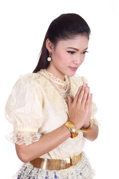 woman wearing typical thai dress pay respect isolated on white background, identity culture of thailand