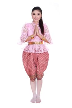 woman wearing typical thai dress pay respect isolated on white background, identity culture of thailand