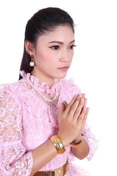 woman wearing typical thai dress pay respect isolated on white background, identity culture of thailand