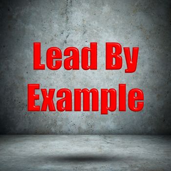 Lead By Example concrete wall