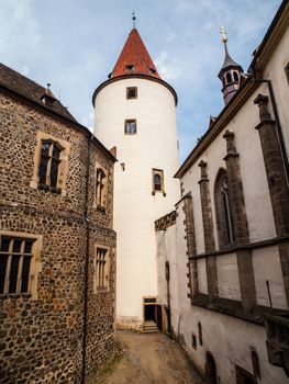 Big white tower of Krivoklat Castle view from courtyard