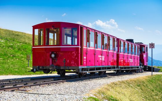ST. WOLFGANG, AUSTRIA - AUGUST 6: Steam train railway going to Schafberg Peak (1783m) on August 6, 2013 in St. Wolfgang.