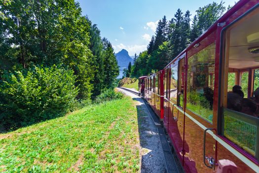 ST. WOLFGANG, AUSTRIA - AUGUST 6: Steam locomotive of a vintage cogwheel railway going to Schafberg Peak (1783m) on August 6, 2013 in St. Wolfgang.