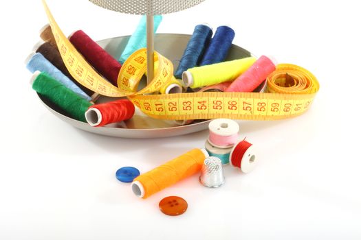 Colorful sewing supplies close up 